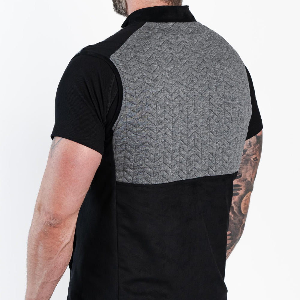 Side view of man wearing Aion Boardroom Recovery Vest in Chevron Gray