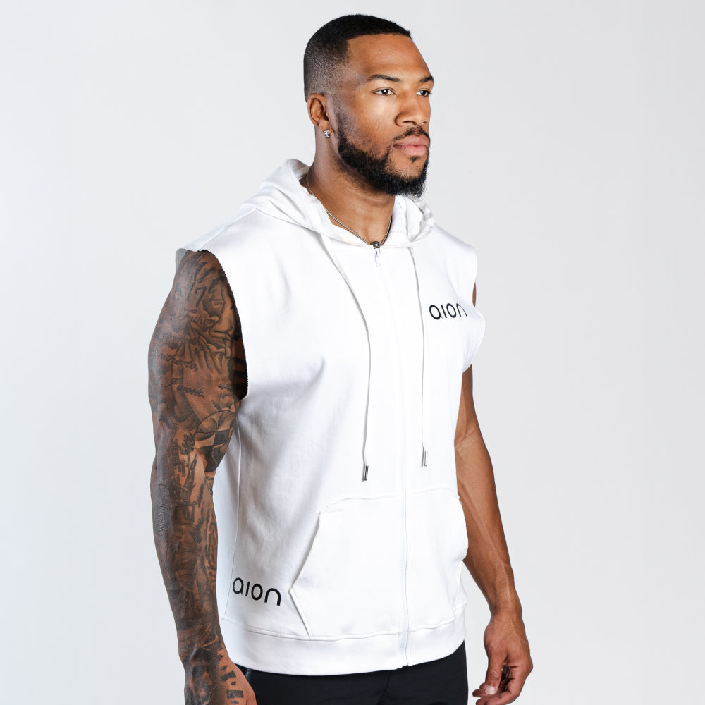 Side view of man wearing Aion oversized zip up hoodie