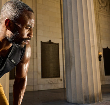 Former Pro Soccer Player Ajay Nwosu (CEO of Teqball USA) wearing the Aion men's weighted vest during a morning weighted vest workout outdoors