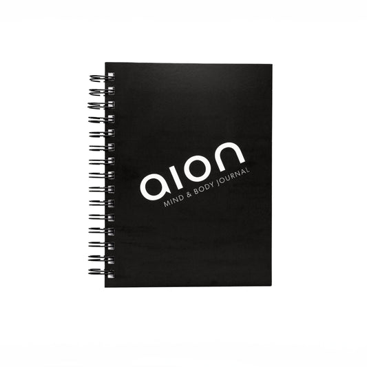 Aion Mind & Body Journal closed on a flat surface